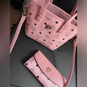 pink mcm purse and matching wallet